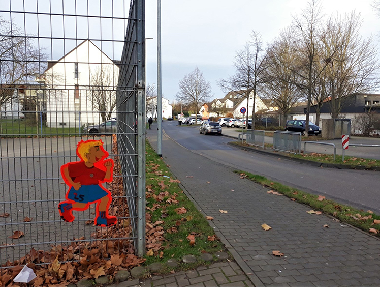 Kinder bemalen Verkehrsfiguren für mehr Verkehrssicherheit